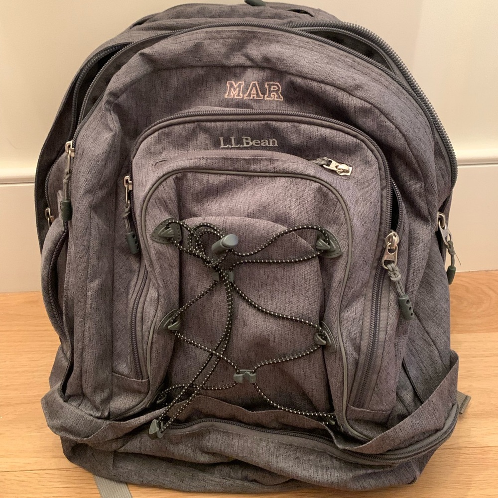 LL Bean three section grey back pack with multiple pockets and adjustable straps